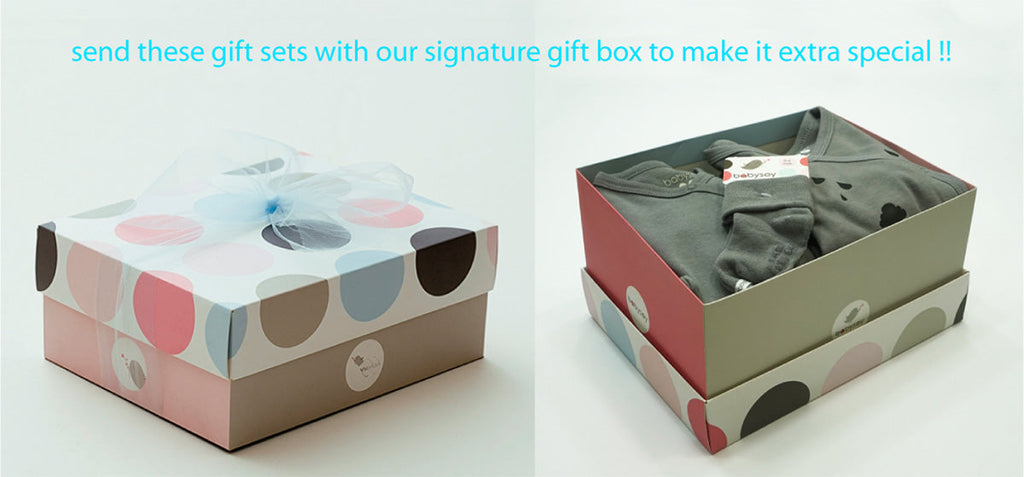 Gift boxes filled with organic baby clothes