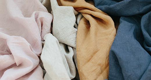 sustainable & organic fabric fibers in pink, grey, indigo and mustard colors
